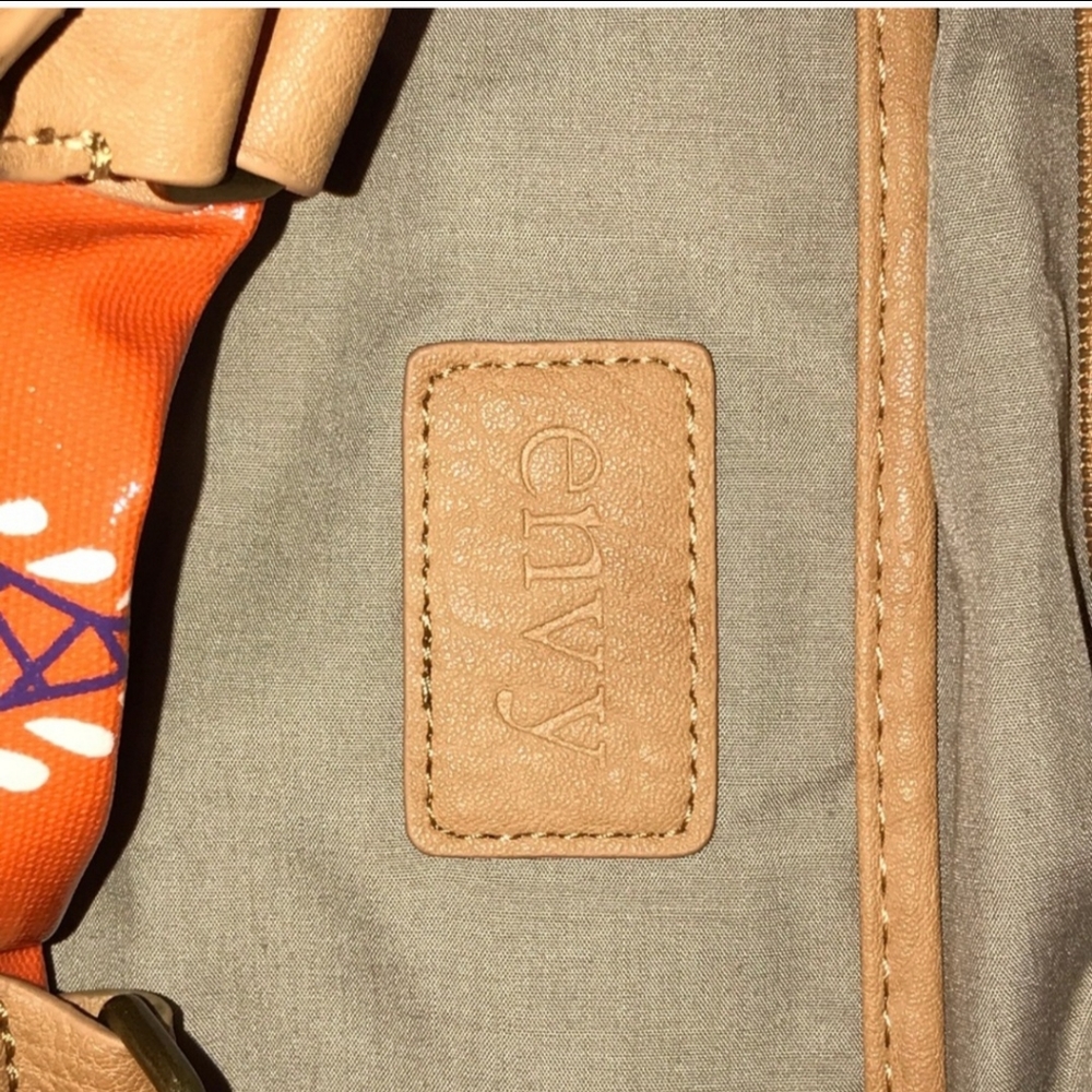 Envy orange,  purple, tan, and gold shoulder bag. Carried once. - Picture 5 of 8